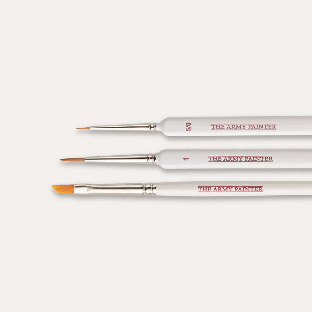 Closeup of the tips of the Army Painter Most Wanted brush set on a white background.