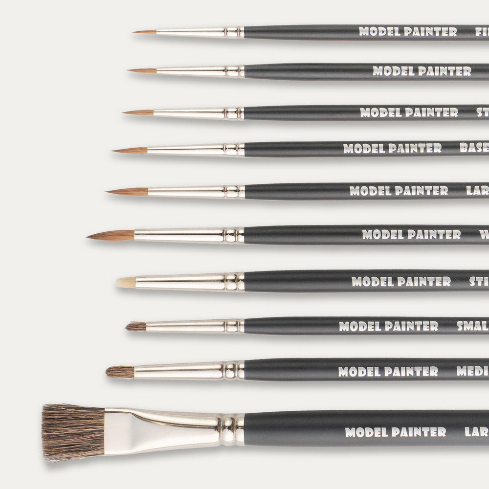 Closeup of the tips of a Set of ABC Brushes Model Painter Sablon and Dry Brushes on a white background.
