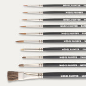 Closeup of the tips of a Set of ABC Brushes Model Painter Sablon and Dry Brushes on a white background.
