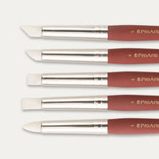 Closeup of the tips of five Pro Arte Colour Applicators arranged in size order, laid out sideways on a white background.