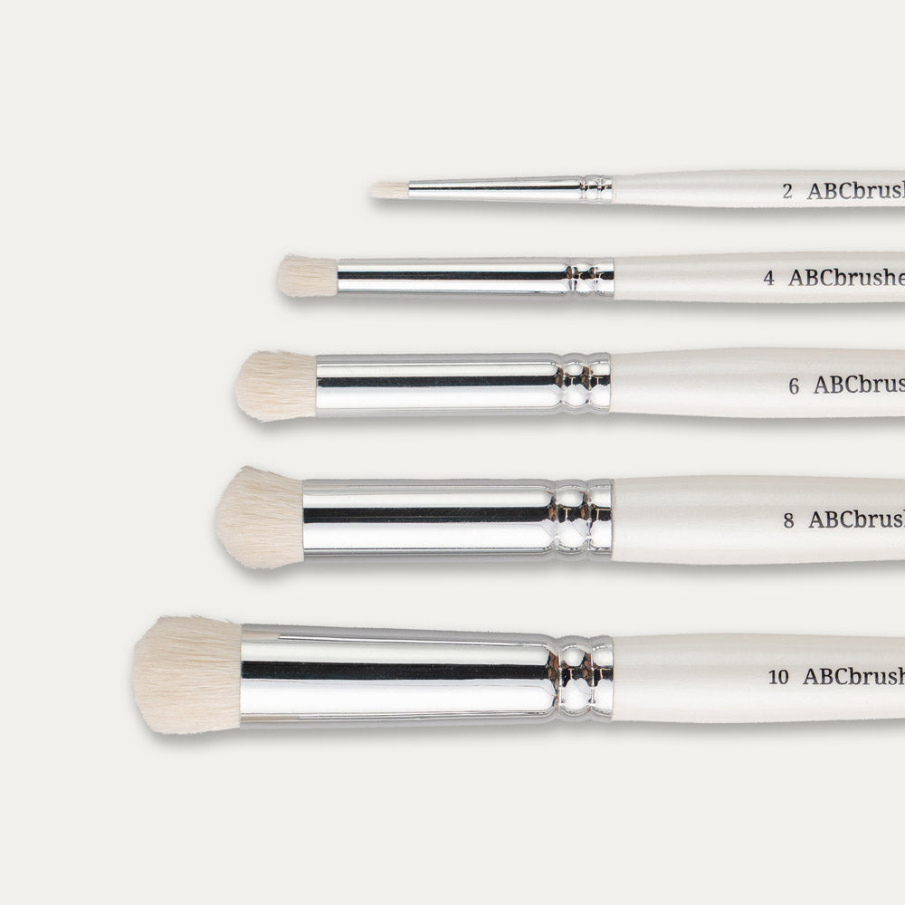 Close-up of the brush tips of the ABC Brushes Rounded Dry Brush set on a white background. 