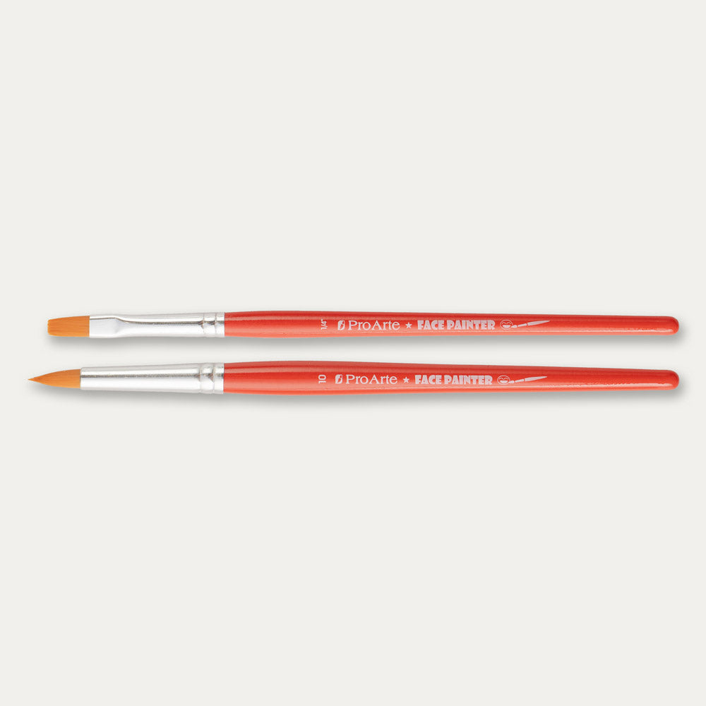 Round and Flat Pro Arte Face Painting brushes laid out sideways on a white background.