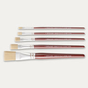 Five Pro Arte Dry Flat brushes arranged in size order, laid out sideways on a white background.
