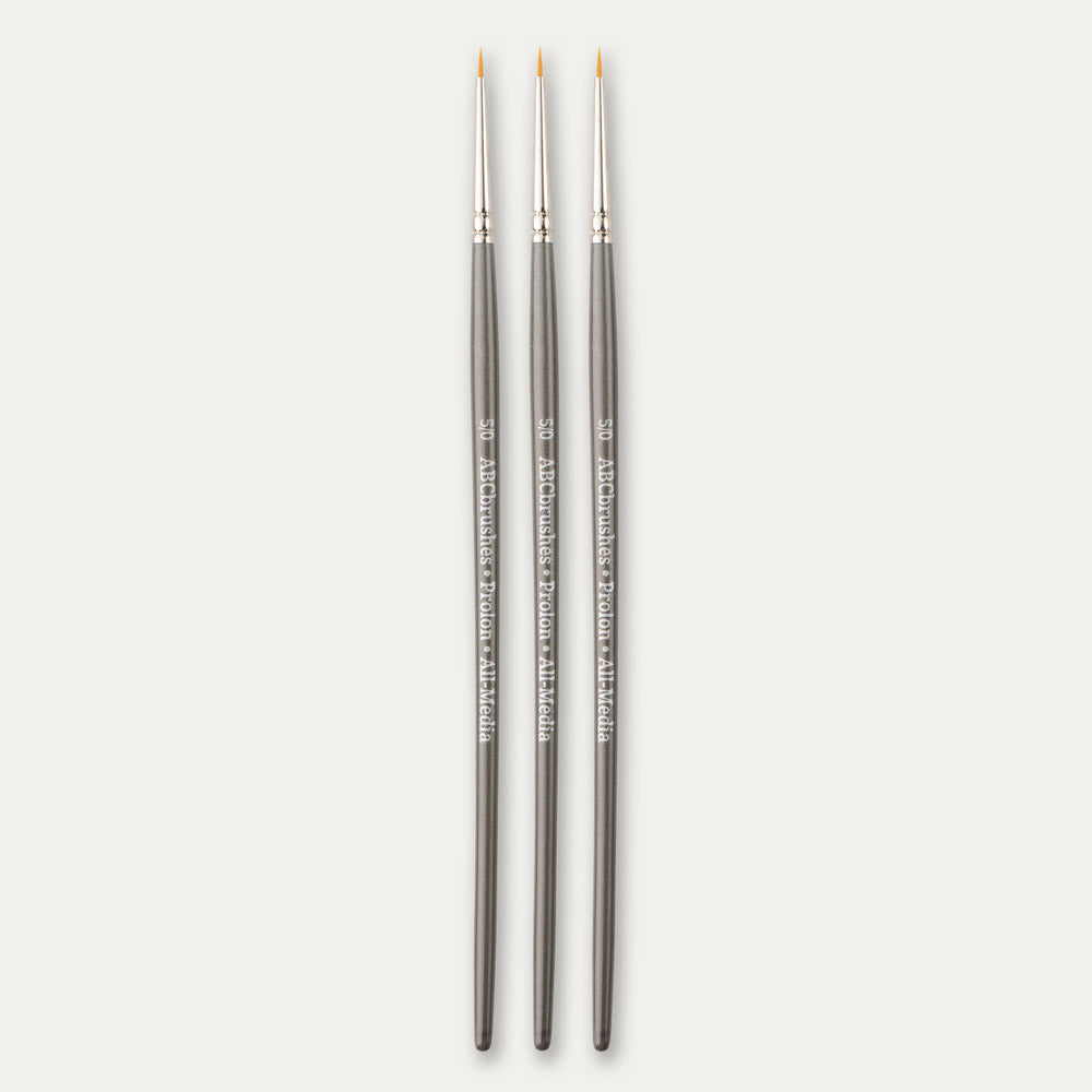 Three size 5/0 ABC Brushes Prolon All Media small brushes on a white background.