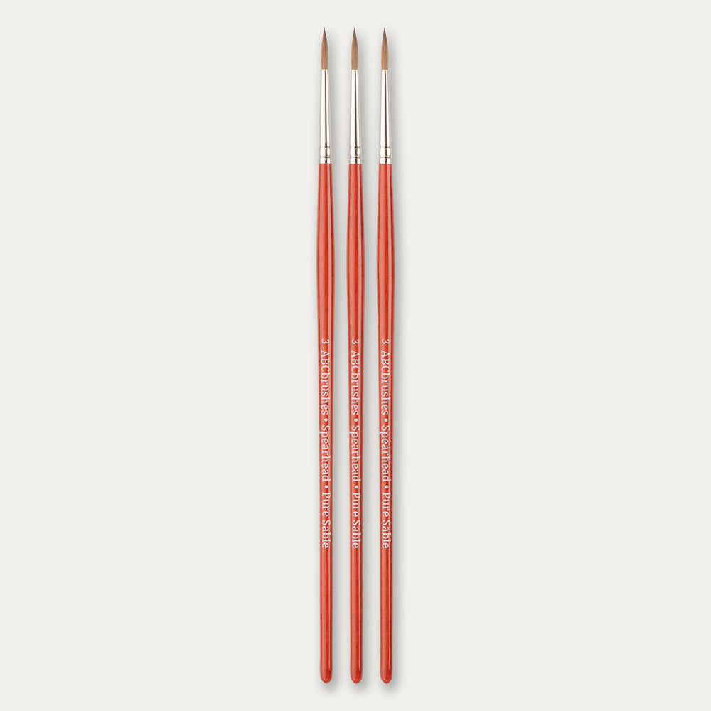 Three size 3 ABC Brushes Spearhead paint brushes on a white background.