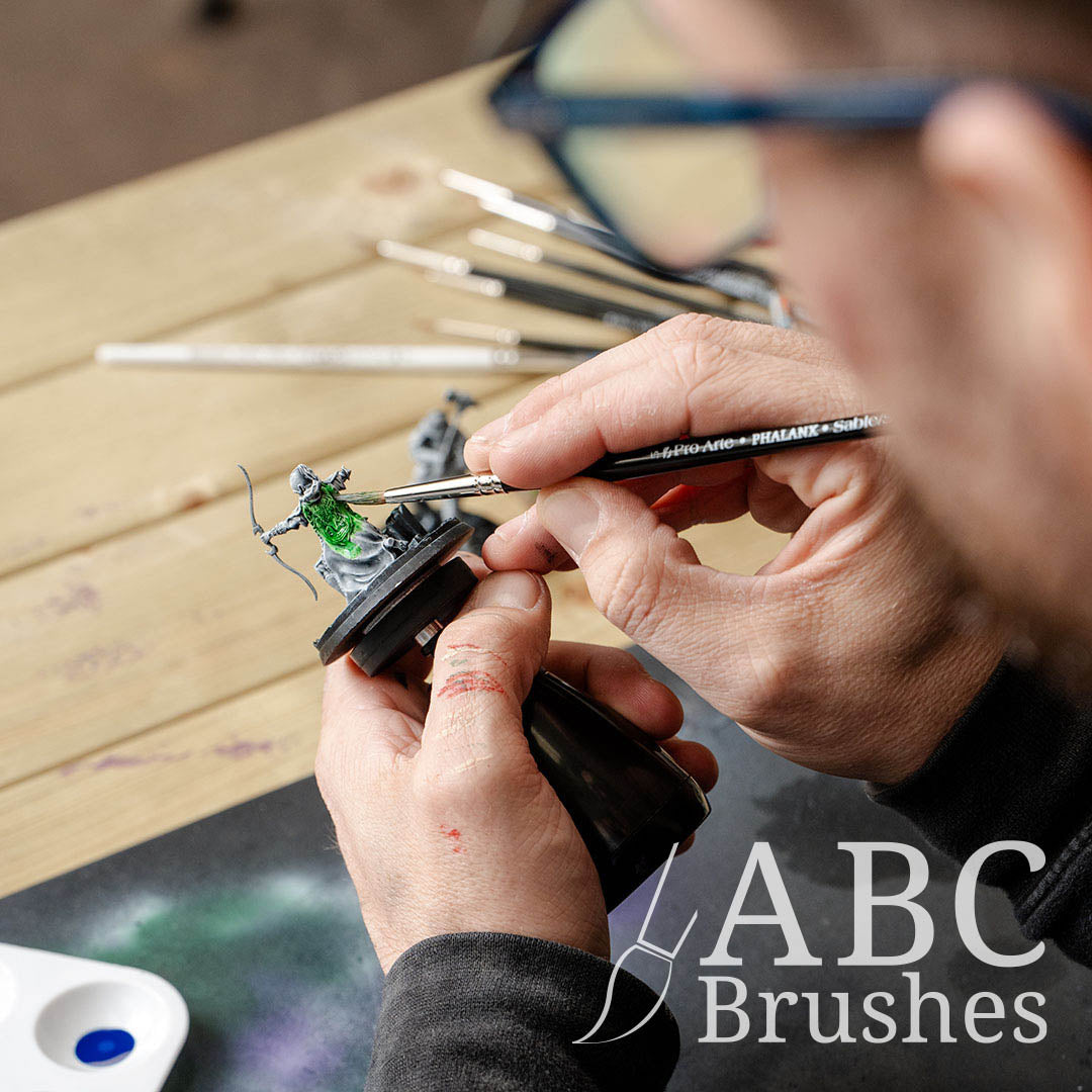 Painting a archer mini green with a Pro Arte Phalanx round paint brush.