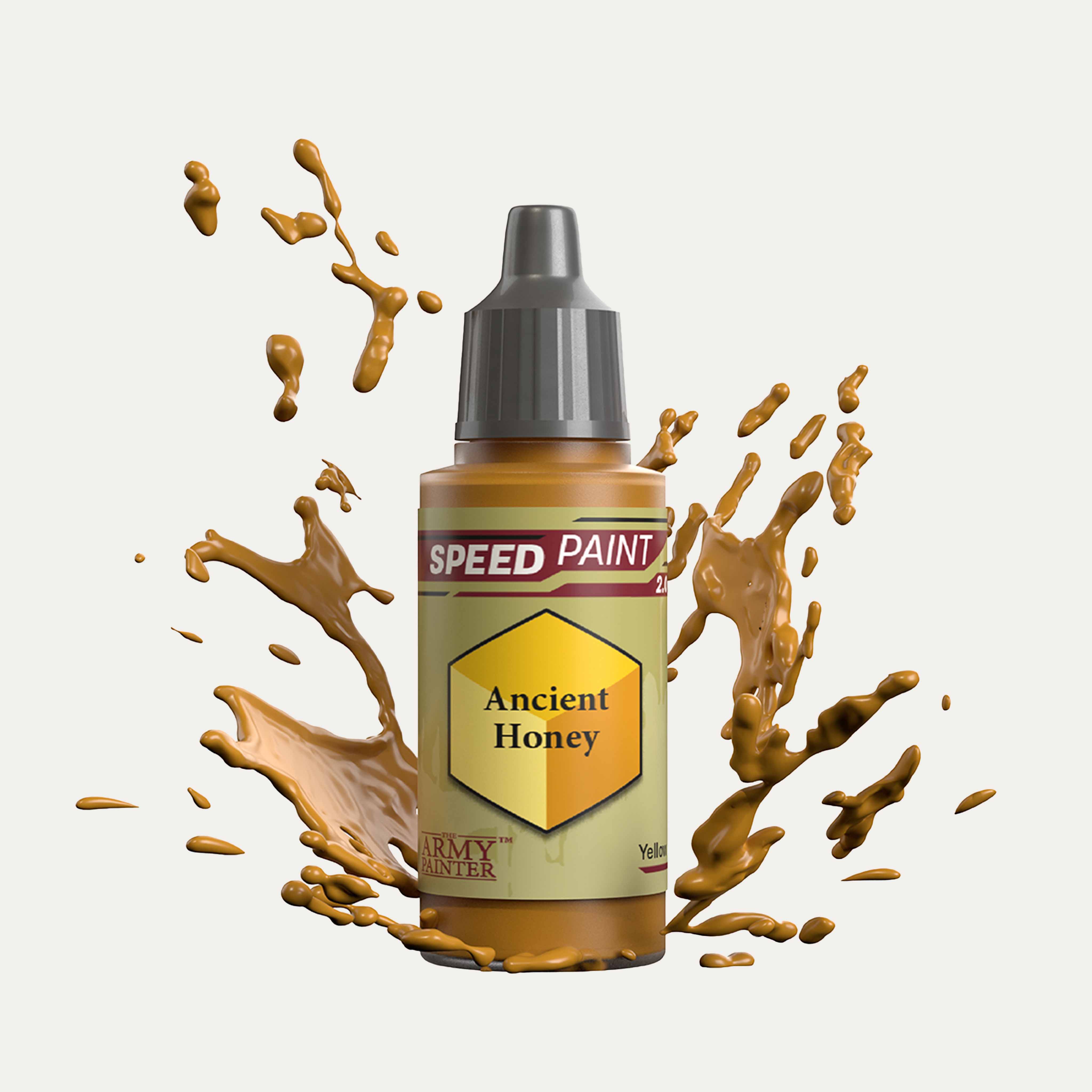 Bottle of the Army Painter Speedpaint in the colour Ancient Honey on a white background. There are splatters of Ancient Honey paint emerging from the bottom of the paint bottle. 