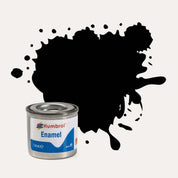 Humbrol Enamel paint tin, with a splatter of Black Matt colour behind it, on a white background.