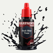 Bottle of the Army Painter Fanatics Wash in the colour Dark Blue Tone on a white background. There are splatters of paint emerging from the bottom of the paint bottle. 