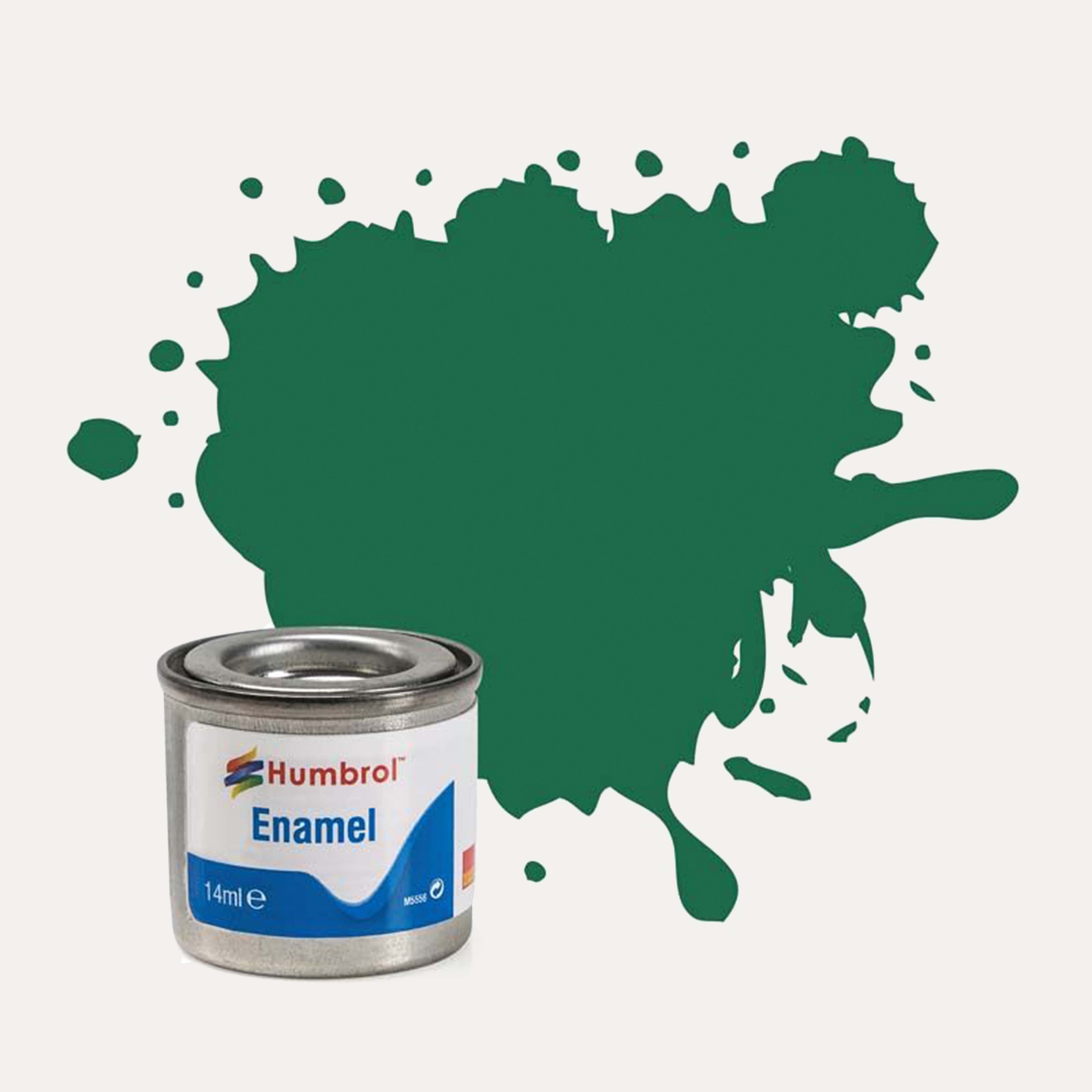 Humbrol Enamel paint tin, with a splatter of Dark Green Matt colour behind it, on a white background.