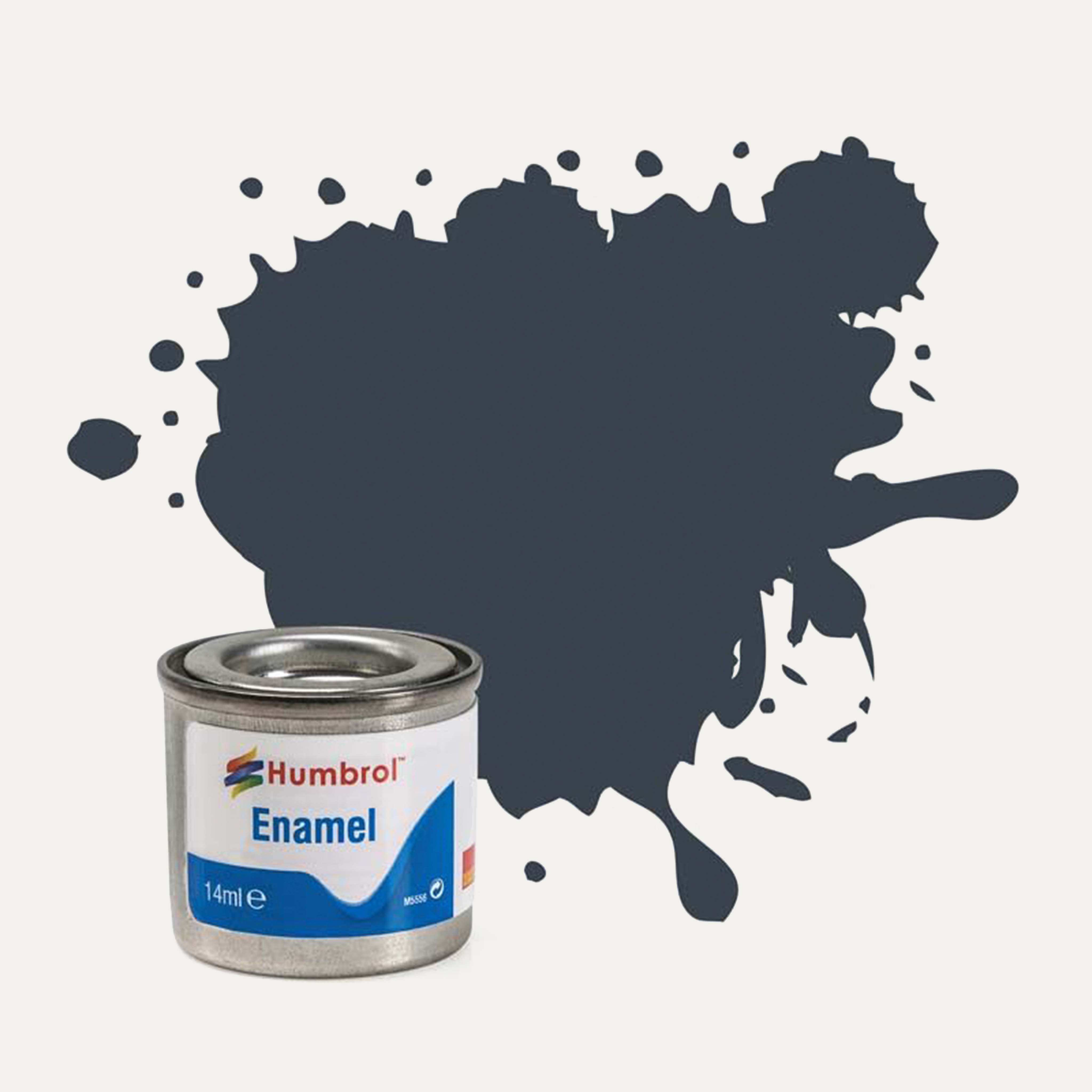 Humbrol Enamel paint tin, with a splatter of Dark Grey Matt colour behind it, on a white background.