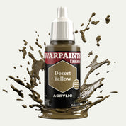 Bottle of the Army Painter Fanatics in the colour Desert Yellow on a white background. There are splatters of paint emerging from the bottom of the paint bottle. 