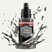 Bottle of the Army Painter Fanatics Metallic paint in the colour Gun Metal on a white background. There are splatters of paint emerging from the bottom of the paint bottle. 