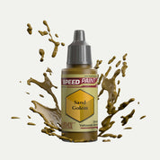 Bottle of the Army Painter Speedpaint in the colour Sand Golem on a white background. There are splatters of Sand Golem paint emerging from the bottom of the paint bottle. 
